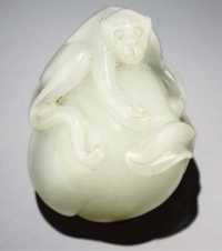 18th century A white jade monkey and peach group